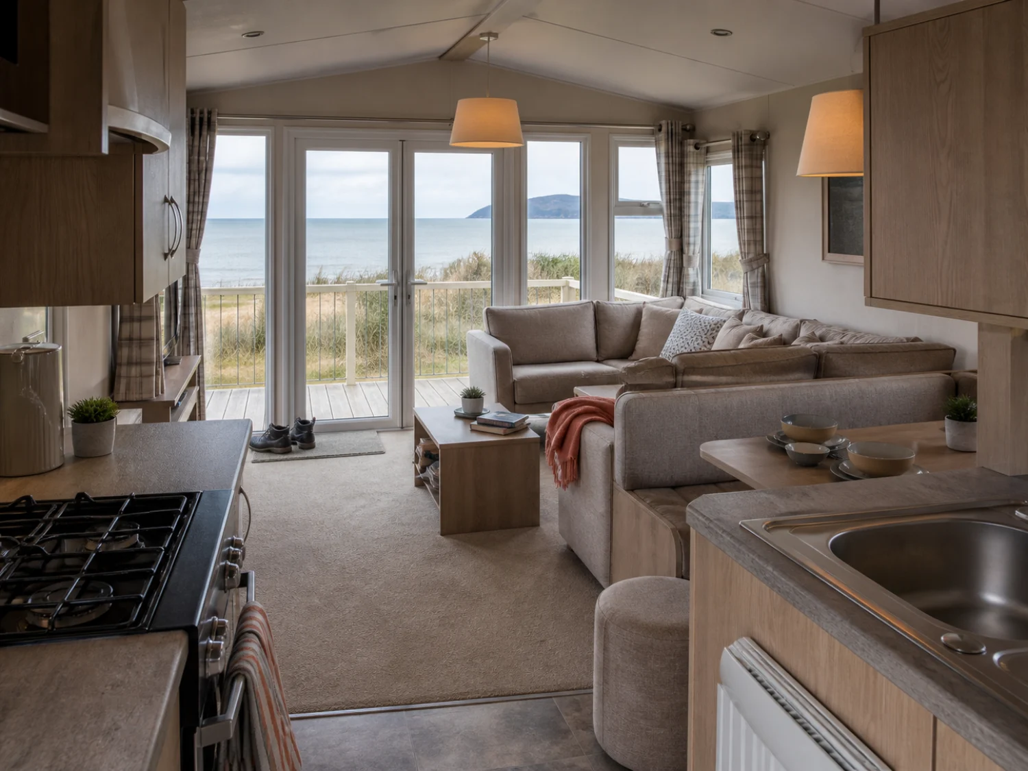Open-plan lounge looking towards the North Wales coast